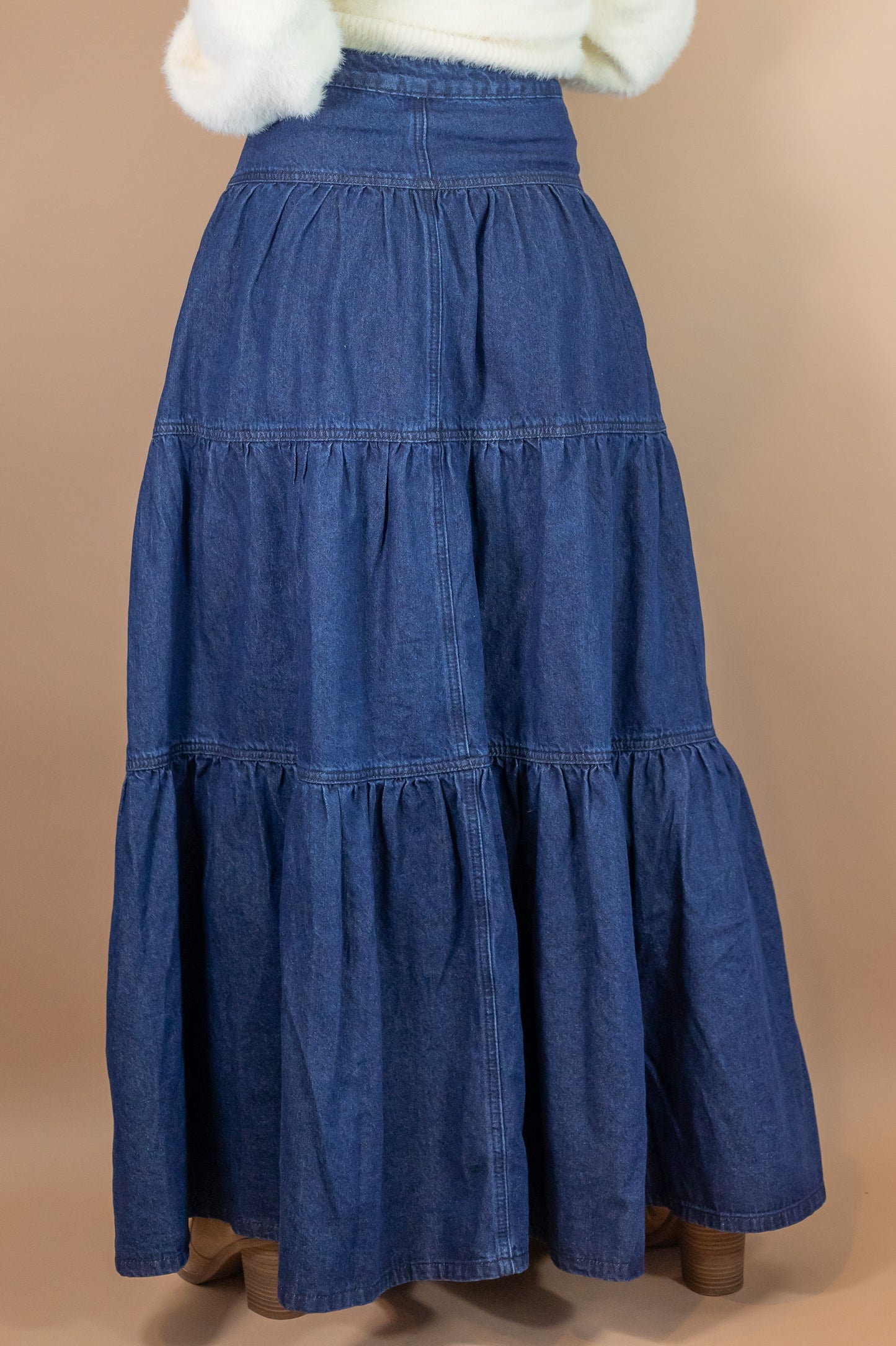 woman's blue denim maxi length skirt back view