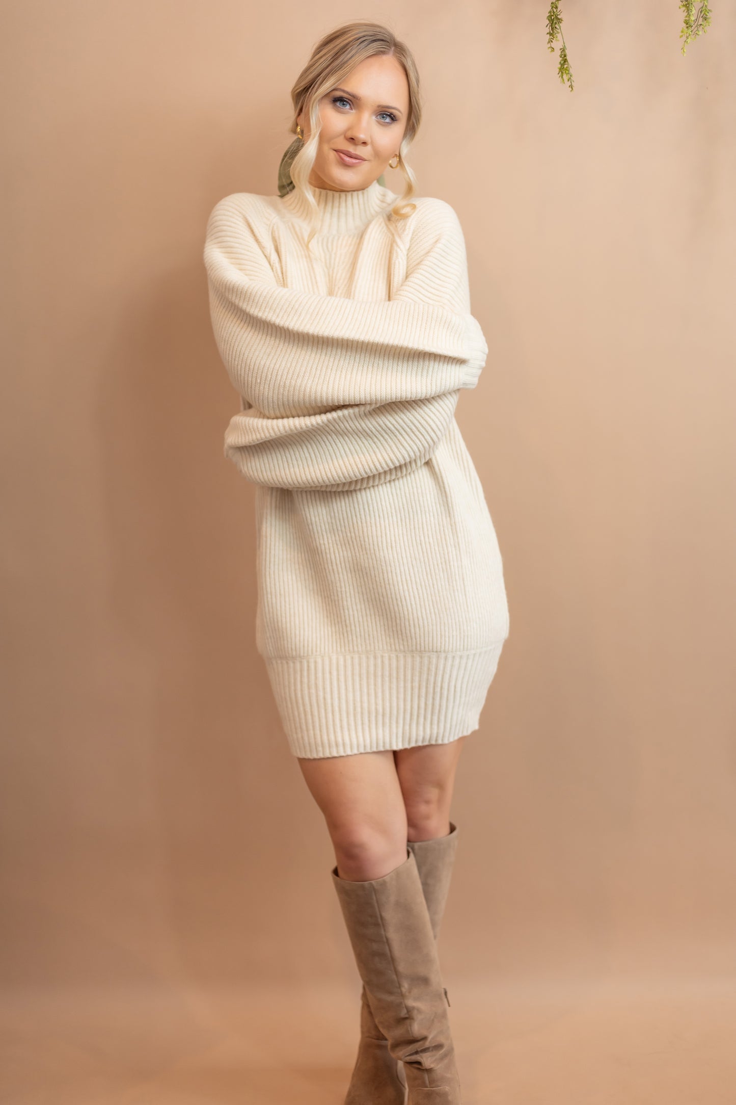 woman's cream sweater dress
